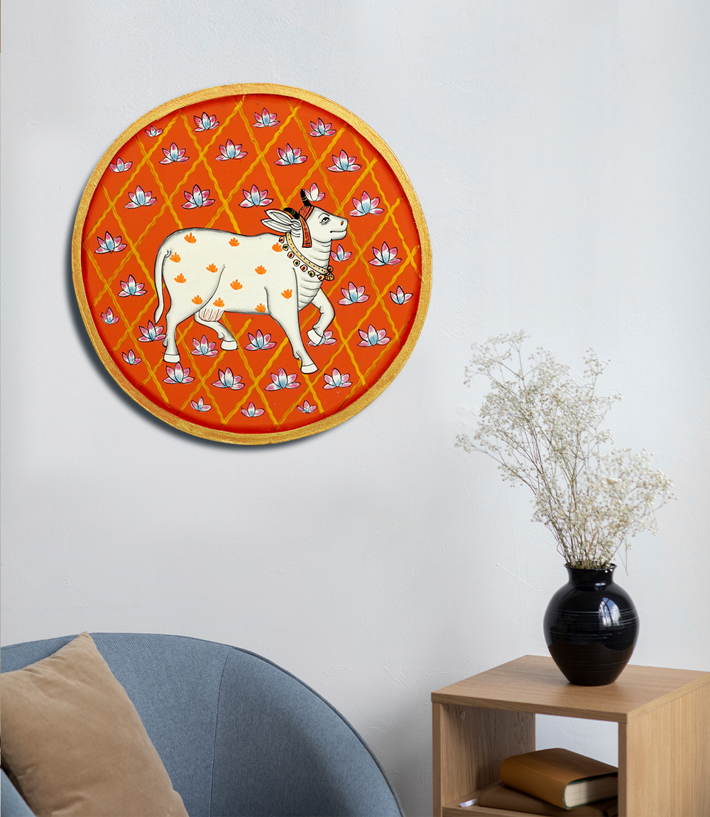 Vibrant Orange Pichwai Cow Wooden Plate – Traditional Rajasthani Art (12")