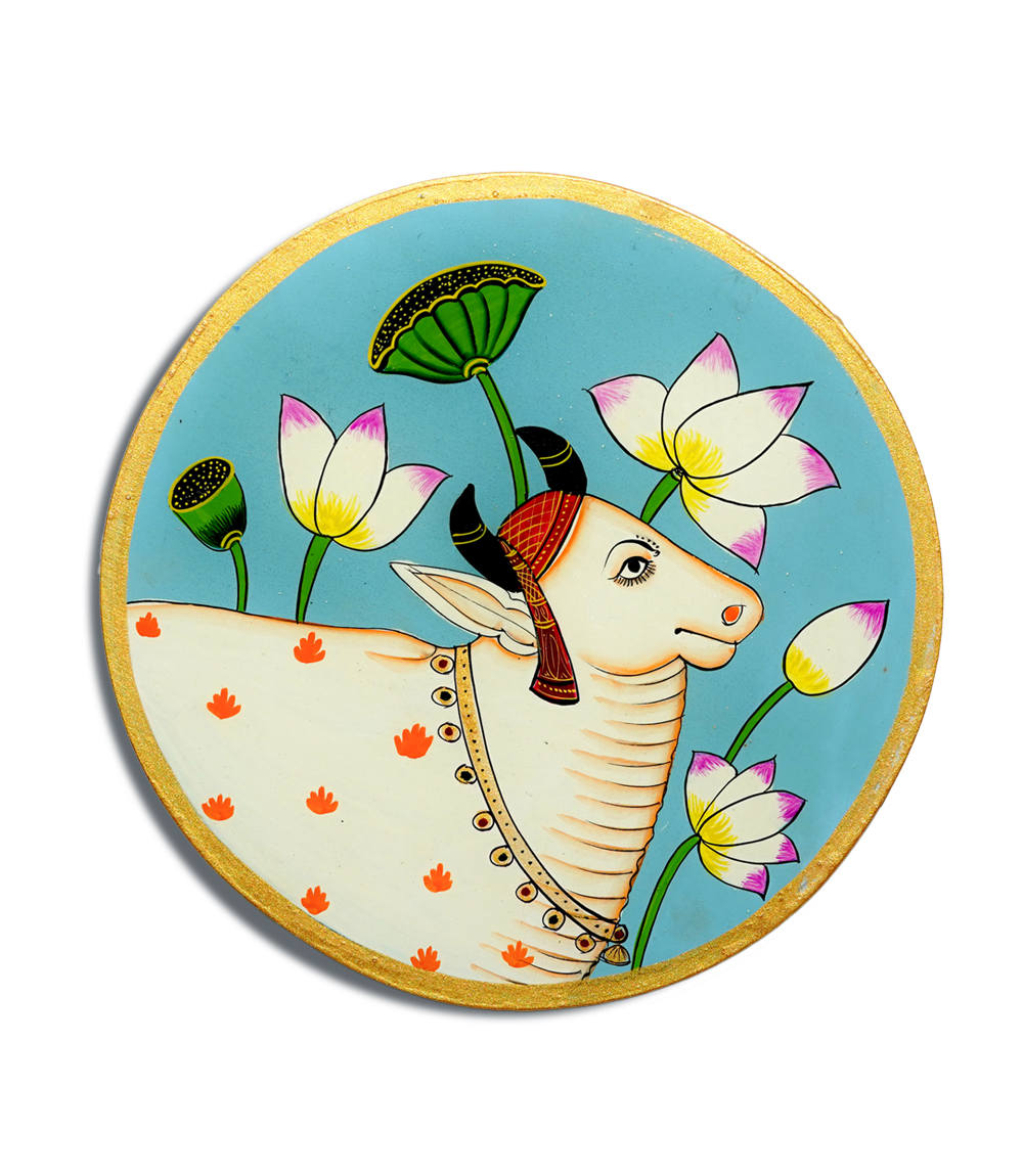 Hand-Painted White Cow and Lotus Pichwai Art on Wooden Plate – Traditional Rajasthani Craft (10")